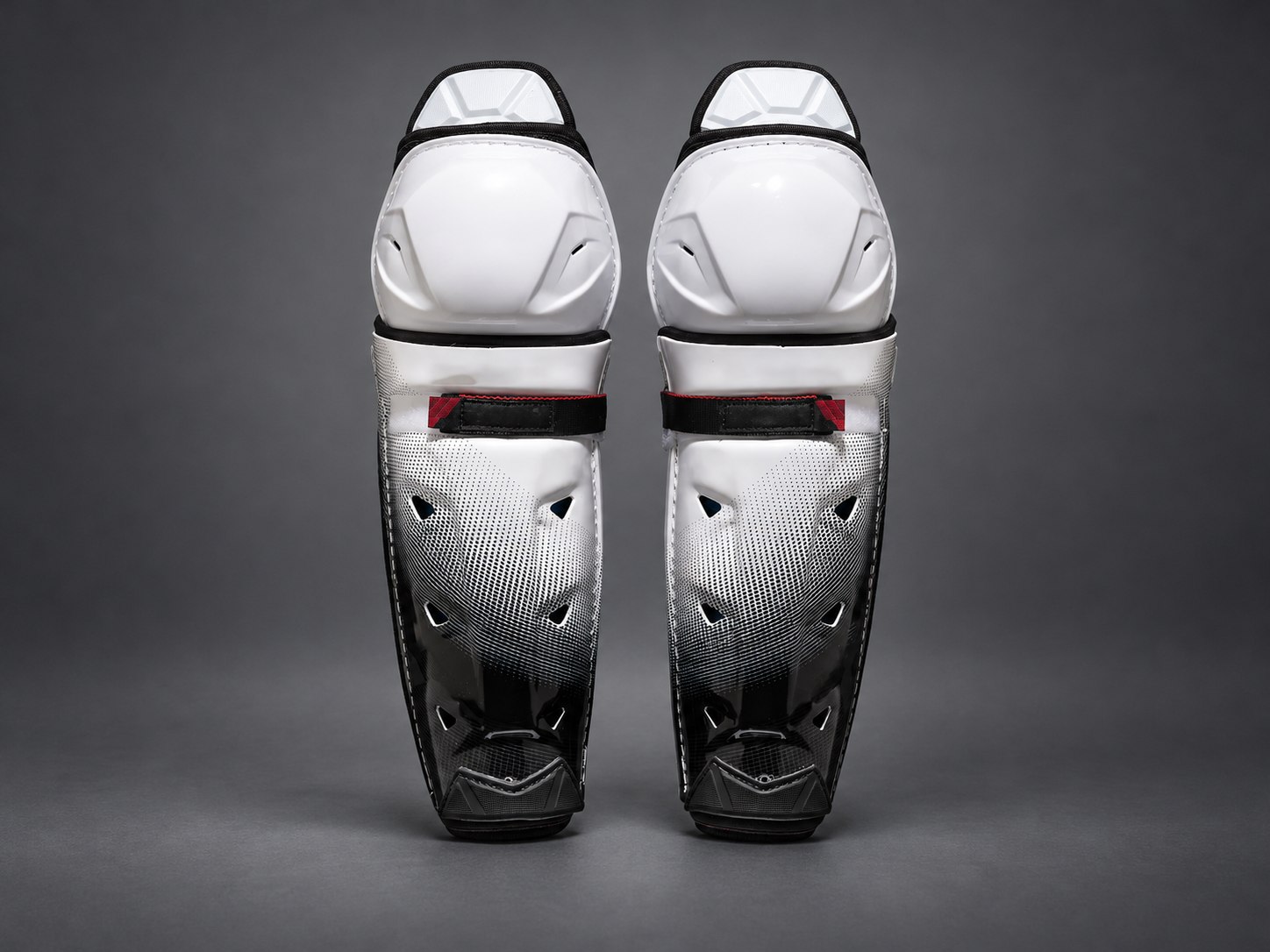 White and black custom hockey shin guard development sample